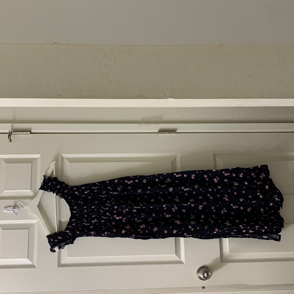 Medium/small navy blue with pinkpurple flowers on it ruffled straps flowers
